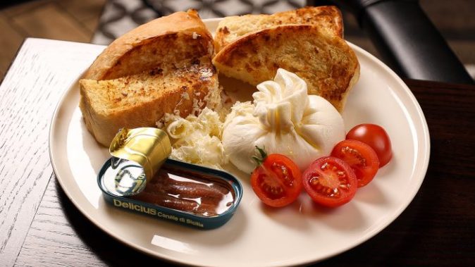 Buratta with anchovies and warm brioche